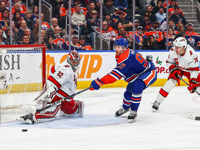EDMONTON, AB - DECEMBER 6: Edmonton Oilers Center Connor McDavid (97) is stopped by Carolina Hurricanes Goalie Antti Raanta (32) in the third period of the Edmonton Oilers game versus the Carolina Hurricanes on December 6, 2023 at Rogers Place in Edmonton, AB.