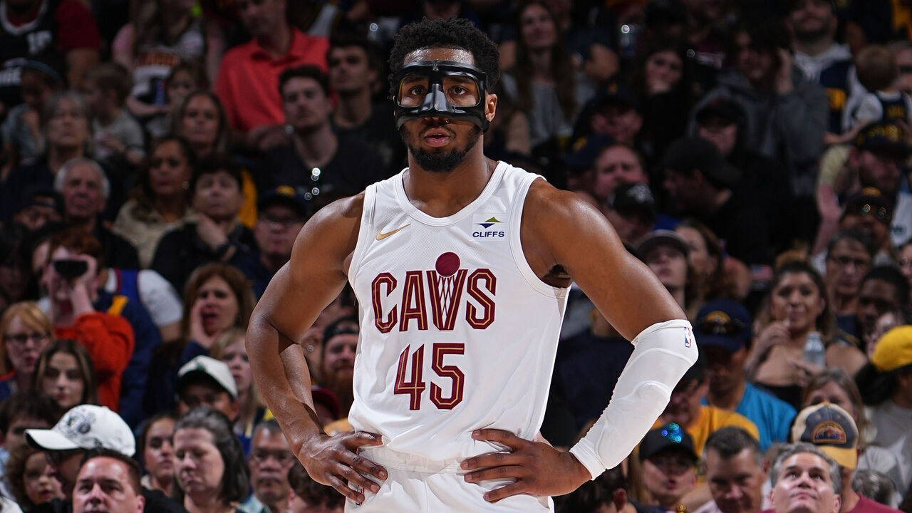 DENVER, CO - MARCH 31: Donovan Mitchell #45 of the Cleveland Cavaliers looks on during the game against the Denver Nuggets on March 31, 2024 at the Ball Arena in Denver, Colorado. NOTE TO USER: User expressly acknowledges and agrees that, by downloading and/or using this Photograph, user is consenting to the terms and conditions of the Getty Images License Agreement. Mandatory Copyright Notice: Copyright 2024 NBAE