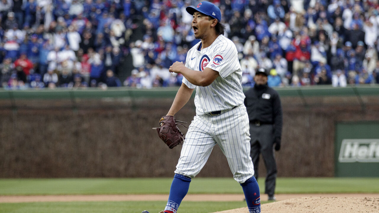 CHICAGO, IL - APRIL 01: Shota Imanaga #18 of the Chicago Cubs celebrates after striking out Nolan Jones #22 of the Colorado Rockies for his ninth strikeout during his MLB debut during the game between the Colorado Rockies and the Chicago Cubs at Wrigley Field on Monday, April 1, 2024 in Chicago, Illinois.