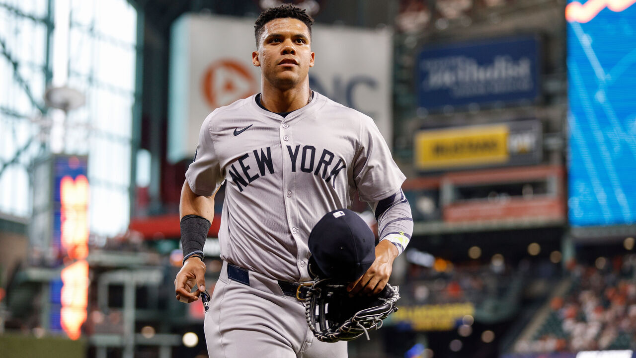 HOUSTON, TEXAS - MARCH 30: Juan Soto #22 of the New York Yankees jogs to the dugout before the game against the Houston Astros at Minute Maid Park on March 30, 2024 in Houston, Texas.