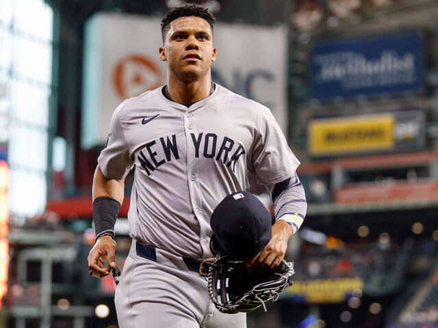 HOUSTON, TEXAS - MARCH 30: Juan Soto #22 of the New York Yankees jogs to the dugout before the game against the Houston Astros at Minute Maid Park on March 30, 2024 in Houston, Texas.