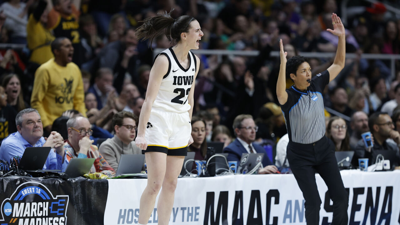 ALBANY, NEW YORK - APRIL 01: Caitlin Clark #22 of the Iowa Hawkeyes reacts during the second half against the LSU Tigers in the Elite 8 round of the NCAA Women's Basketball Tournament at MVP Arena on April 01, 2024 in Albany, New York.