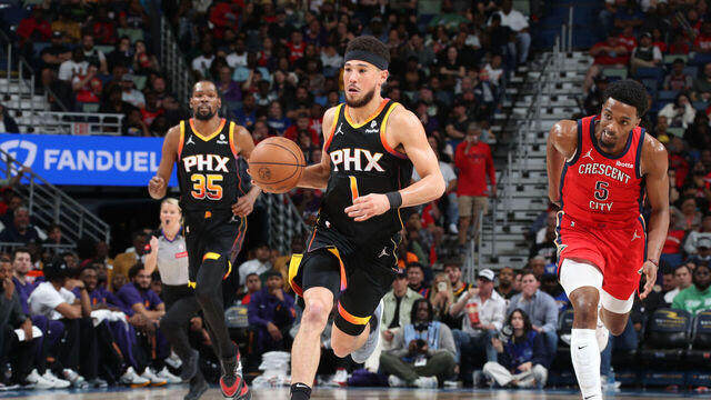 NEW ORLEANS, LA - APRIL 1: Devin Booker #1 of the Phoenix Suns handles the ball during the game against the New Orleans Pelicans on April 1, 2024 at the Smoothie King Center in New Orleans, Louisiana. Mandatory Copyright Notice: Copyright 2024 NBAE
