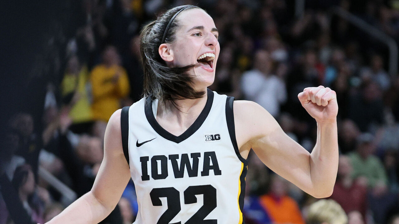 ALBANY, NEW YORK - APRIL 01:Caitlin Clark #22 of the Iowa Hawkeyes celebrates after beating the LSU Tigers 94-87 in the Elite 8 round of the NCAA Women's Basketball Tournament at MVP Arena on April 01, 2024 in Albany, New York.