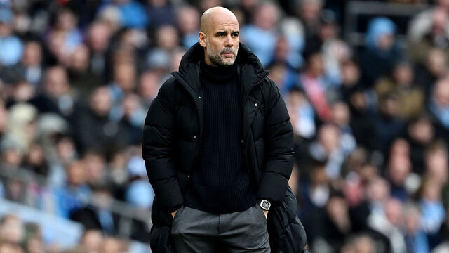 MANCHESTER, ENGLAND - MARCH 31: Pep Guardiola, Manager of Manchester City, looks on during the Premier League match between Manchester City and Arsenal FC at Etihad Stadium on March 31, 2024 in Manchester, England.