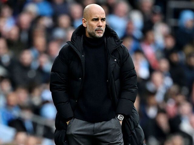 MANCHESTER, ENGLAND - MARCH 31: Pep Guardiola, Manager of Manchester City, looks on during the Premier League match between Manchester City and Arsenal FC at Etihad Stadium on March 31, 2024 in Manchester, England.