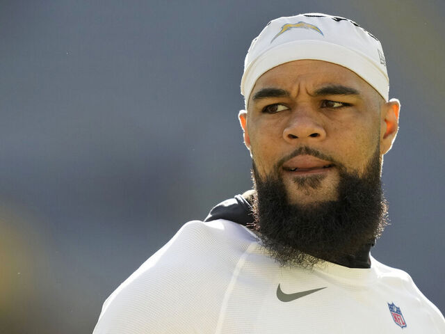 GREEN BAY, WISCONSIN - NOVEMBER 19: Keenan Allen #13 of the Los Angeles Chargers warms up before a game against the Green Bay Packers at Lambeau Field on November 19, 2023 in Green Bay, Wisconsin.
