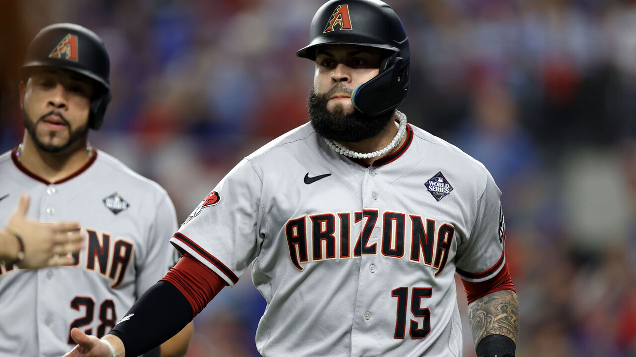 ARLINGTON, TEXAS - OCTOBER 28: Emmanuel Rivera #15 of the Arizona Diamondbacks celebrates with teammates after scoring a run in the eighth inning against the Texas Rangers during Game Two of the World Series at Globe Life Field on October 28, 2023 in Arlington, Texas.