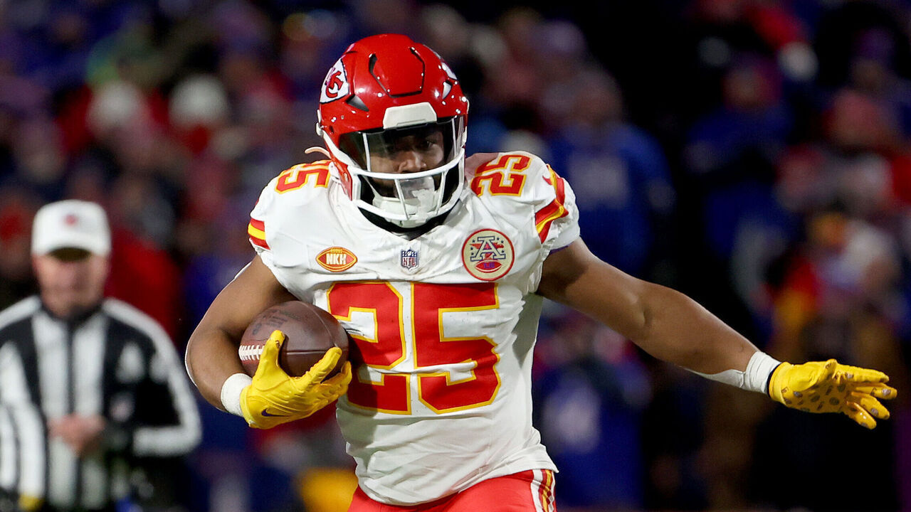 ORCHARD PARK, NEW YORK - JANUARY 21: Clyde Edwards-Helaire #25 of the Kansas City Chiefs breaks a tackle by Dane Jackson #30 of the Buffalo Bills during the second quarter in the AFC Divisional Playoff game at Highmark Stadium on January 21, 2024 in Orchard Park, New York.