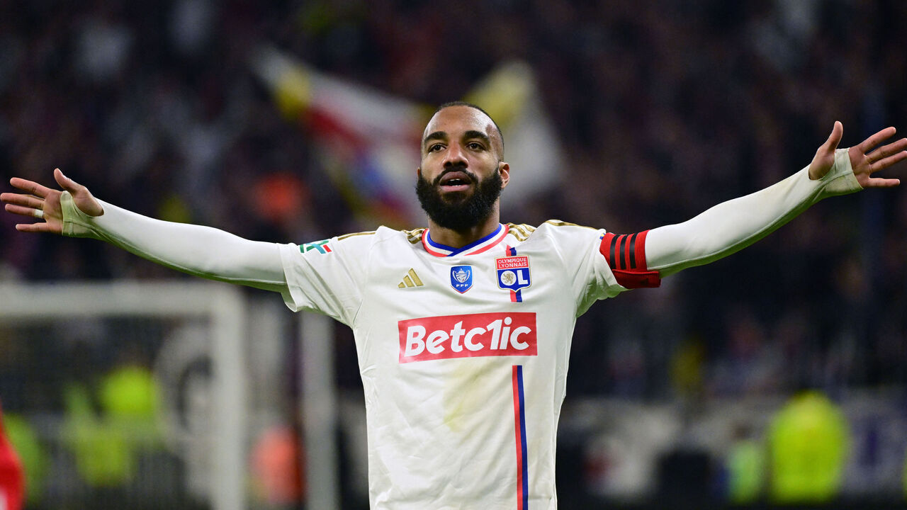 Lyon's French forward #10 Alexandre Lacazette celebrates after scoring during the French Cup (Coupe de France) semi final match between Olympique Lyonnais (OL) and Valenciennes FC at the Groupama Stadium, in Decines-Charpieu, east of Lyon on April 2, 2024.