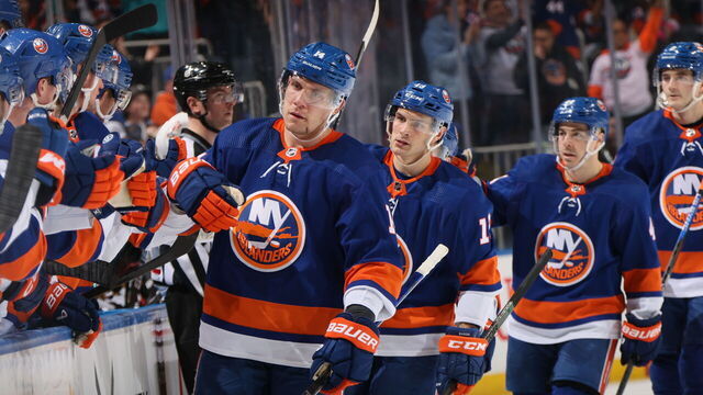 ELMONT, NEW YORK - APRIL 02: Bo Horvat #14 of the New York Islanders celebrates his powerplay goal against the Chicago Blackhawks at 1:33 of the third period at UBS Arena on April 02, 2024 in Elmont, New York.