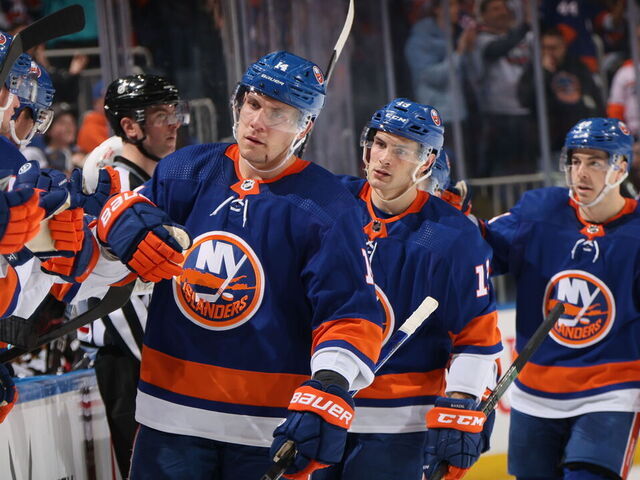ELMONT, NEW YORK - APRIL 02: Bo Horvat #14 of the New York Islanders celebrates his powerplay goal against the Chicago Blackhawks at 1:33 of the third period at UBS Arena on April 02, 2024 in Elmont, New York.