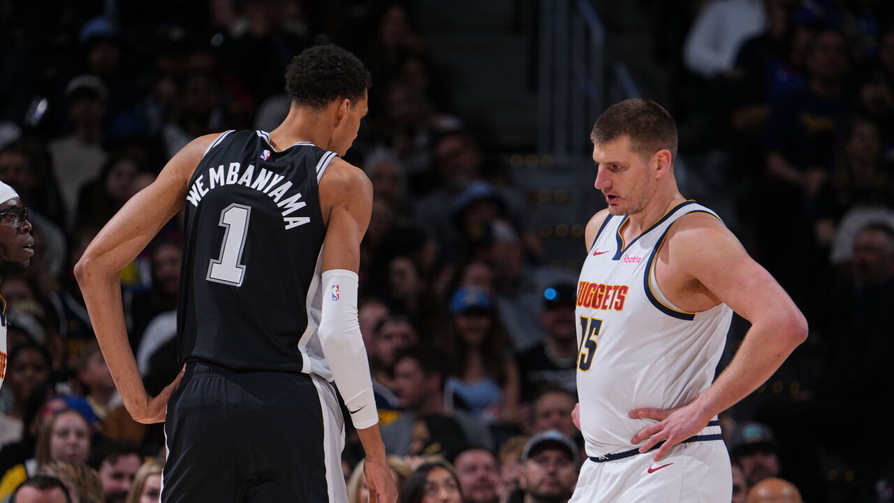 DENVER, CO - APRIL 2: Victor Wembanyama #1 of the San Antonio Spurs and Nikola Jokic #15 of the Denver Nuggets looks on during the game on April 2, 2024 at the Ball Arena in Denver, Colorado. NOTE TO USER: User expressly acknowledges and agrees that, by downloading and/or using this Photograph, user is consenting to the terms and conditions of the Getty Images License Agreement. Mandatory Copyright Notice: Copyright 2024 NBAE