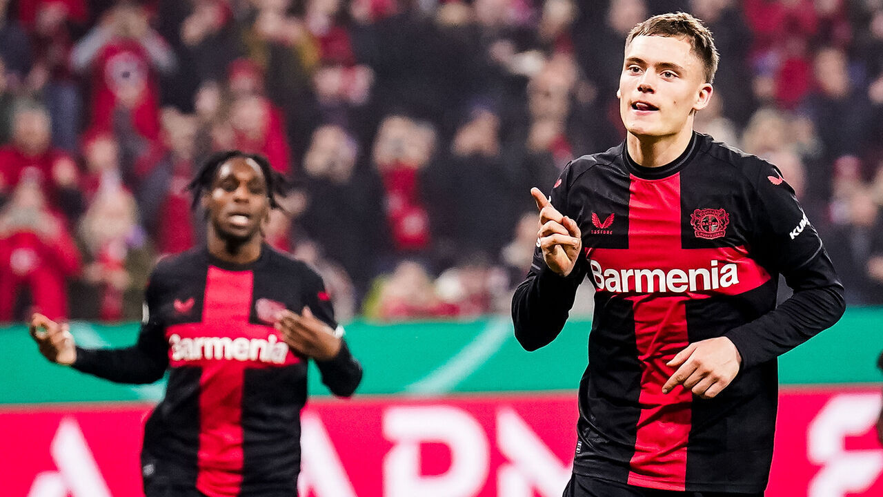 LEVERKUSEN, GERMANY - APRIL 3: Florian Wirtz of Bayer 04 Leverkusen celebrates after scoring his team's fourth goal during the DFB cup semifinal match between Bayer 04 Leverkusen and Fortuna Düsseldorf at BayArena on April 3, 2024 in Leverkusen, Germany.