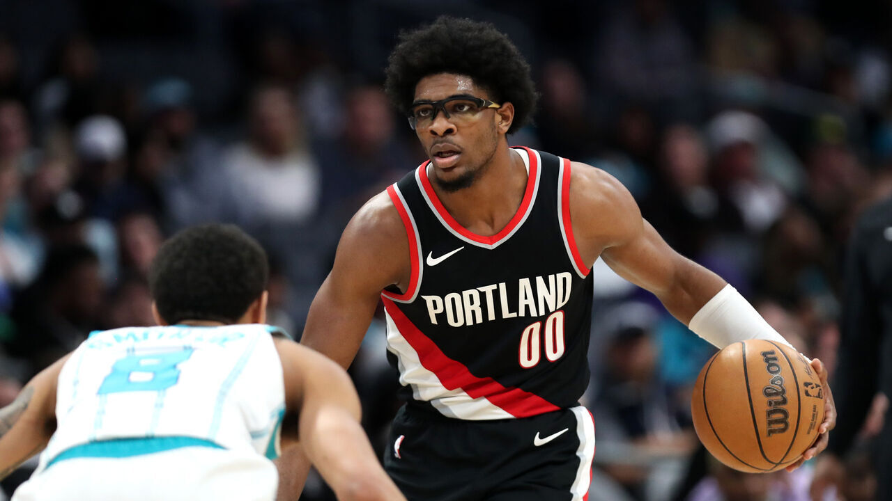 CHARLOTTE, NORTH CAROLINA - APRIL 03: Scoot Henderson #00 of the Portland Trail Blazers controls the ball during the second half against the Charlotte Hornets at Spectrum Center on April 03, 2024 in Charlotte, North Carolina.