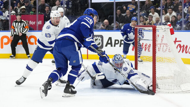 TORONTO, ON - APRIL 3: Tyler Bertuzzi #59 of the Toronto Maple Leafs shoots against Andrei Vasilevskiy #88 of the Tampa Bay Lightning during the second period at Scotiabank Arena on April 3, 2024 in Toronto, Ontario, Canada.