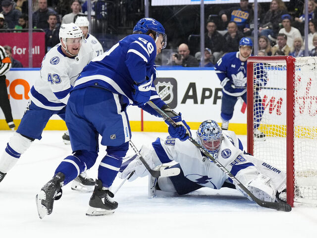 TORONTO, ON - APRIL 3: Tyler Bertuzzi #59 of the Toronto Maple Leafs shoots against Andrei Vasilevskiy #88 of the Tampa Bay Lightning during the second period at Scotiabank Arena on April 3, 2024 in Toronto, Ontario, Canada.