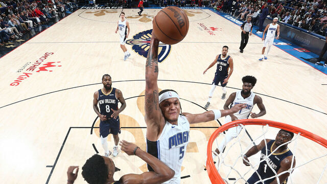NEW ORLEANS, LA - APRIL 3: Paolo Banchero #5 of the Orlando Magic drives to the basket during the game against the New Orleans Pelicans on April 3, 2024 at the Smoothie King Center in New Orleans, Louisiana. Mandatory Copyright Notice: Copyright 2024 NBAE