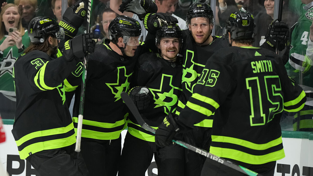 DALLAS, TEXAS - APRIL 03: Radek Faksa #12 of the Dallas Stars is congratulated by Chris Tanev #3, Ryan Suter #20, Sam Steel #18, and Craig Smith #15 after scoring a goal in the first period against the Edmonton Oilers at American Airlines Center on April 03, 2024 in Dallas, Texas.