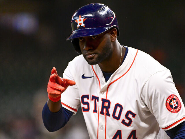 HOUSTON, TEXAS - APRIL 03: Yordan Alvarez #44 of the Houston Astros gestures to the Toronto Blue Jays dugout prior to batting in the first inning at Minute Maid Park on April 03, 2024 in Houston, Texas.