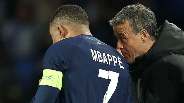 Paris Saint-Germain's French forward #07 Kylian Mbappe listens to Paris Saint-Germain's Spanish coach Luis Enrique during the UEFA Champions League last 16 second leg football match between Real Sociedad and Paris Saint-Germain (PSG) at the Anoeta stadium in San Sebastian on March 5, 2024.