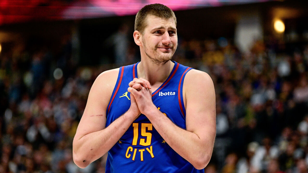 DENVER, COLORADO - MARCH 9: Nikola Jokic #15 of the Denver Nuggets reacts to a referee decision in the second half of a game against the Utah Jazz at Ball Arena on March 9, 2024 in Denver, Colorado.