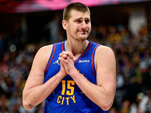 DENVER, COLORADO - MARCH 9: Nikola Jokic #15 of the Denver Nuggets reacts to a referee decision in the second half of a game against the Utah Jazz at Ball Arena on March 9, 2024 in Denver, Colorado.