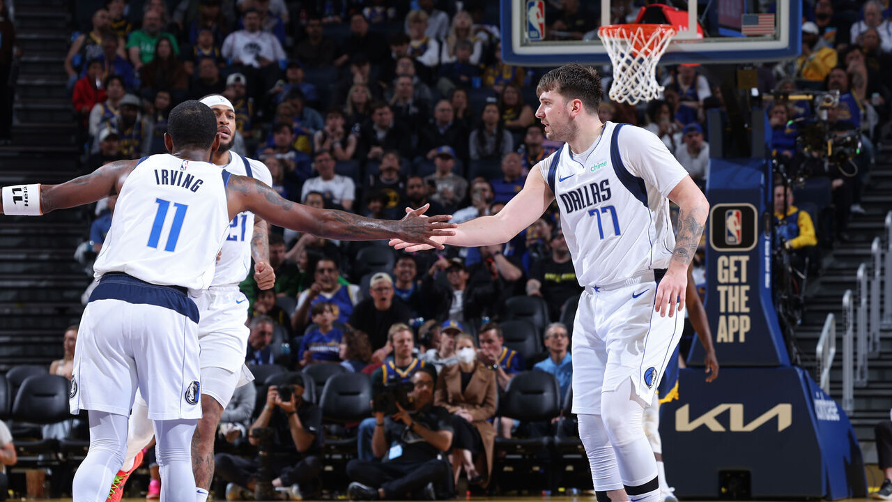 SAN FRANCISCO, CA - APRIL 2: Luka Doncic #77 and Kyrie Irving #11 of the Dallas Mavericks react during the game against the Golden State Warriors on April 2, 2024 at Chase Center in San Francisco, California. NOTE TO USER: User expressly acknowledges and agrees that, by downloading and or using this photograph, user is consenting to the terms and conditions of Getty Images License Agreement. Mandatory Copyright Notice: Copyright 2024 NBAE