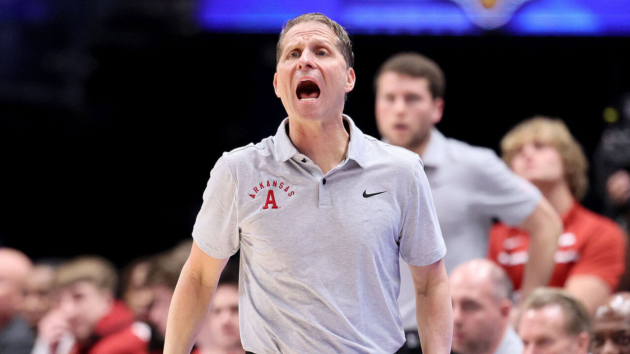 NASHVILLE, TENNESSEE - MARCH 14: Eric Musselman the head coach of the Arkansas Razorbacks gives instructions to his team against the South Carolina Gamecocks during the second round of the SEC Basketball Tournament at Bridgestone Arena on March 14, 2024 in Nashville, Tennessee.