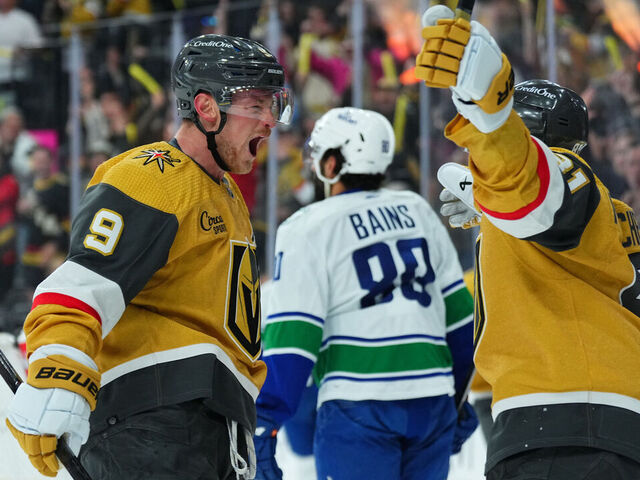 LAS VEGAS, NEVADA - APRIL 02: Jack Eichel #9 of the Vegas Golden Knights celebrates with Jonathan Marchessault #81 after a goal during the first period against the Vancouver Canucks at T-Mobile Arena on April 02, 2024 in Las Vegas, Nevada.