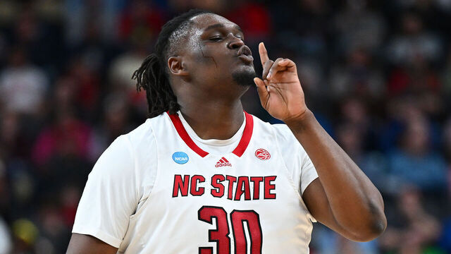 PITTSBURGH, PENNSYLVANIA - MARCH 23: DJ Burns Jr. #30 of the North Carolina State Wolfpack reacts during the first half of a gameagainst the Oakland Golden Grizzlies in the second round of the NCAA Men's Basketball Tournament at PPG PAINTS Arena on March 23, 2024 in Pittsburgh, Pennsylvania.
