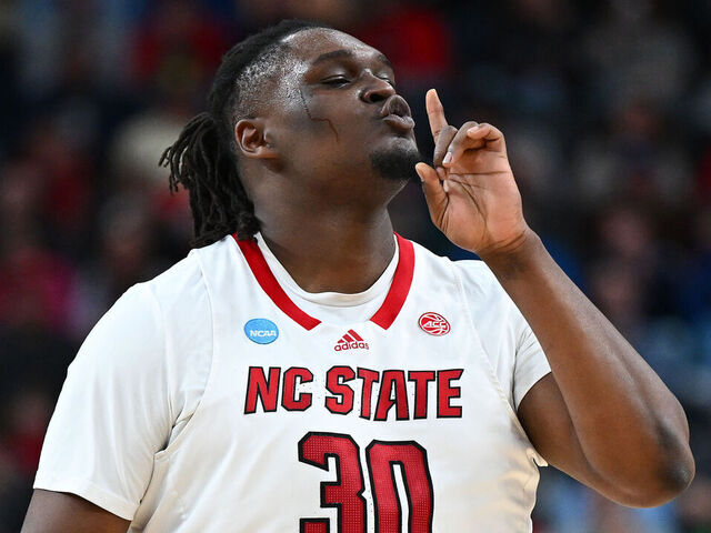 PITTSBURGH, PENNSYLVANIA - MARCH 23: DJ Burns Jr. #30 of the North Carolina State Wolfpack reacts during the first half of a gameagainst the Oakland Golden Grizzlies in the second round of the NCAA Men's Basketball Tournament at PPG PAINTS Arena on March 23, 2024 in Pittsburgh, Pennsylvania.