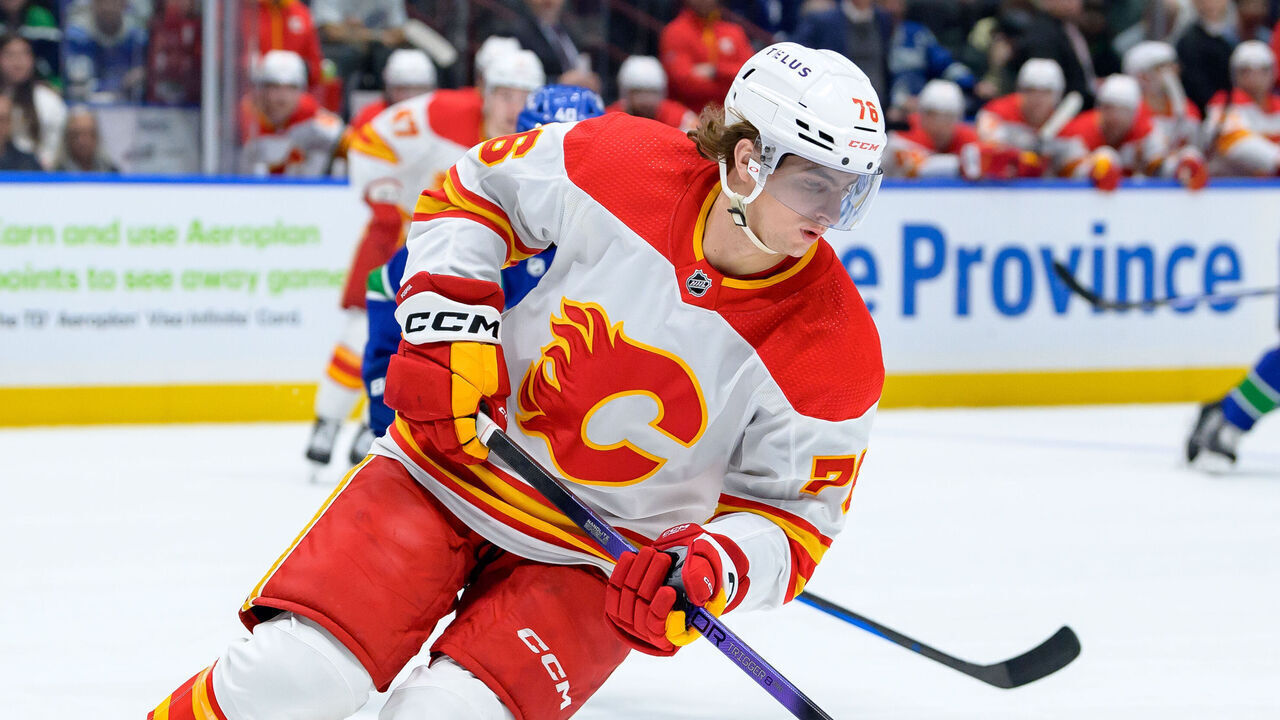VANCOUVER, CANADA - MARCH 23: Martin Pospisil #76 of the Calgary Flames skates with the puck during the first period of their NHL game against the Vancouver Canucks at Rogers Arena on March 23, 2024 in Vancouver, British Columbia, Canada.