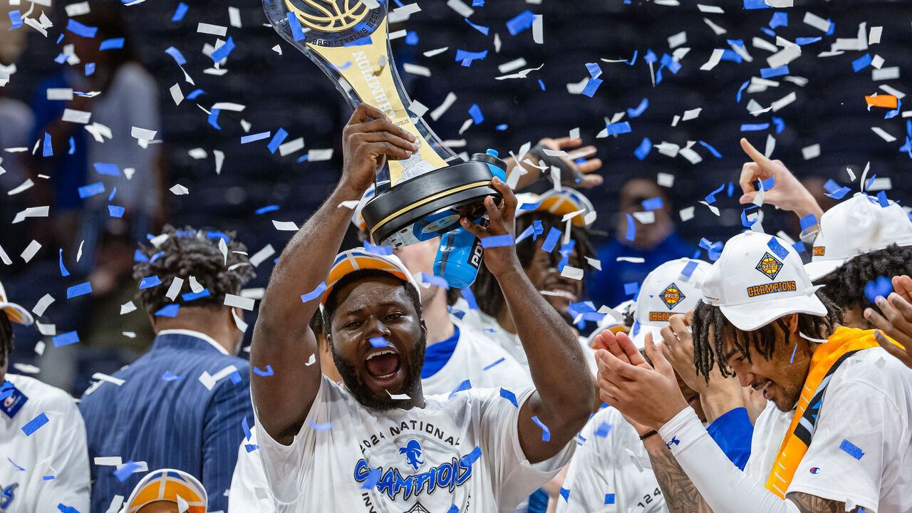 INDIANAPOLIS, INDIANA - APRIL 04: Dylan Addae-Wusu #0 of the Seton Hall Pirates holds the NIT trophy following the game against the Indiana State Sycamores in the NIT championship at Hinkle Fieldhouse on April 4, 2024 in Indianapolis, Indiana.