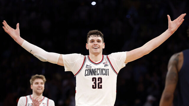 NEW YORK, NEW YORK - MARCH 16: Donovan Clingan #32 of the Connecticut Huskies reacts in the final seconds in the second half against the Marquette Golden Eagles during the Big East Basketball Tournament Final at Madison Square Garden on March 16, 2024 in New York City. The Huskies won 73-57.