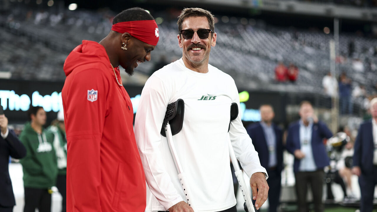 EAST RUTHERFORD, NJ - OCTOBER 01: Aaron Rodgers #8 of the New York Jets smiles with Marquez Valdes-Scantling #11 of the Kansas City Chiefs prior to an NFL football game at MetLife Stadium on October 1, 2023 in East Rutherford, New Jersey.