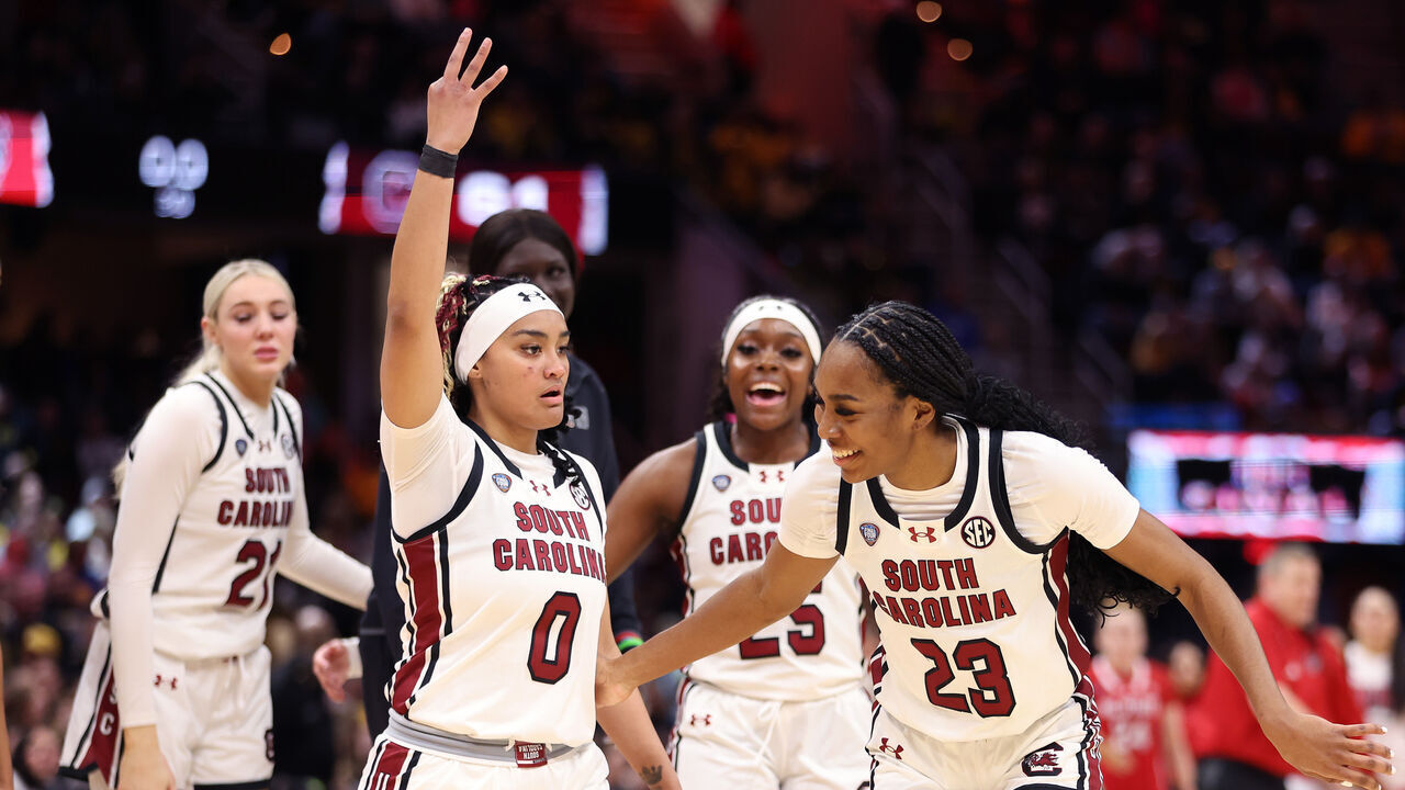 CLEVELAND, OHIO - APRIL 05: Te-Hina Paopao #0 and Bree Hall #23 of the South Carolina Gamecocks react after a three point basket in the second half during the NCAA Women's Basketball Tournament Final Four semifinal game against the NC State Wolfpack at Rocket Mortgage Fieldhouse on April 05, 2024 in Cleveland, Ohio.