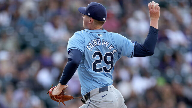 DENVER, COLORADO - APRIL 05: Pitcher Pete Fairbanks #29 of the Tampa Bay Rays throws against the Colorado Rockies during the ninth inning of the home opener on April 05, 2024 in Denver, Colorado.