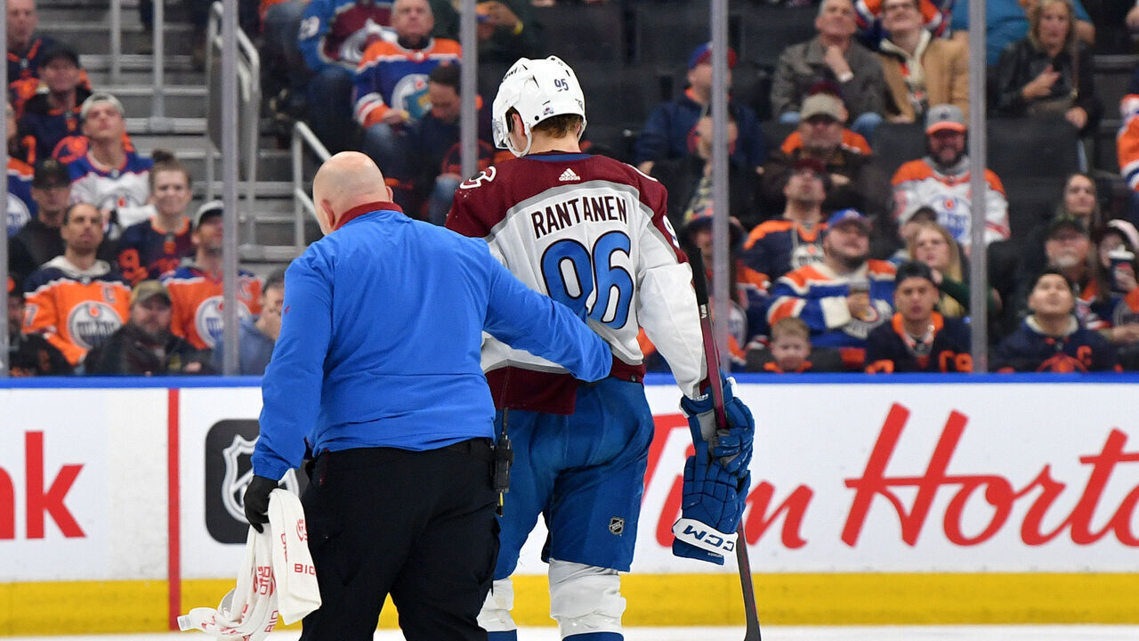 EDMONTON, CANADA - APRIL 5: Mikko Rantanen #96 of the Colorado Avalanche is helped off the ice during the second period against the Edmonton Oilers at Rogers Place on April 5, 2024, in Edmonton, Alberta, Canada.