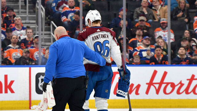 EDMONTON, CANADA - APRIL 5: Mikko Rantanen #96 of the Colorado Avalanche is helped off the ice during the second period against the Edmonton Oilers at Rogers Place on April 5, 2024, in Edmonton, Alberta, Canada.