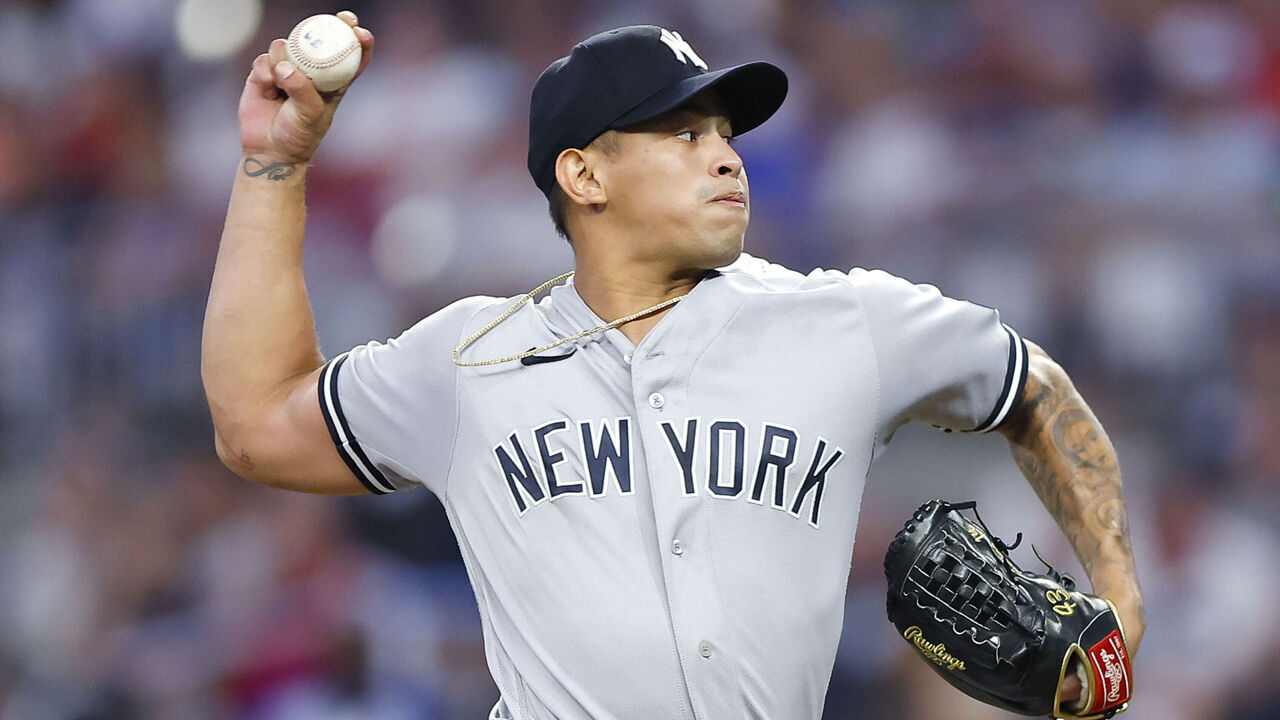 ATLANTA, GEORGIA - AUGUST 15: Jonathan Loaisiga #43 of the New York Yankees pitches during the sixth inning against the Atlanta Braves at Truist Park on August 15, 2023 in Atlanta, Georgia.