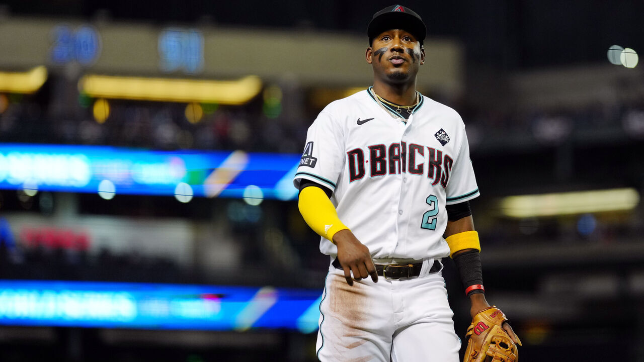 PHOENIX, AZ - NOVEMBER 01: Geraldo Perdomo #2 of the Arizona Diamondbacks returns to the dugout during Game 5 of the 2023 World Series between the Texas Rangers and the Arizona Diamondbacks at Chase Field on Wednesday, November 1, 2023 in Phoenix, Arizona.