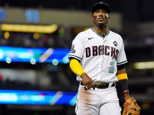 PHOENIX, AZ - NOVEMBER 01: Geraldo Perdomo #2 of the Arizona Diamondbacks returns to the dugout during Game 5 of the 2023 World Series between the Texas Rangers and the Arizona Diamondbacks at Chase Field on Wednesday, November 1, 2023 in Phoenix, Arizona.