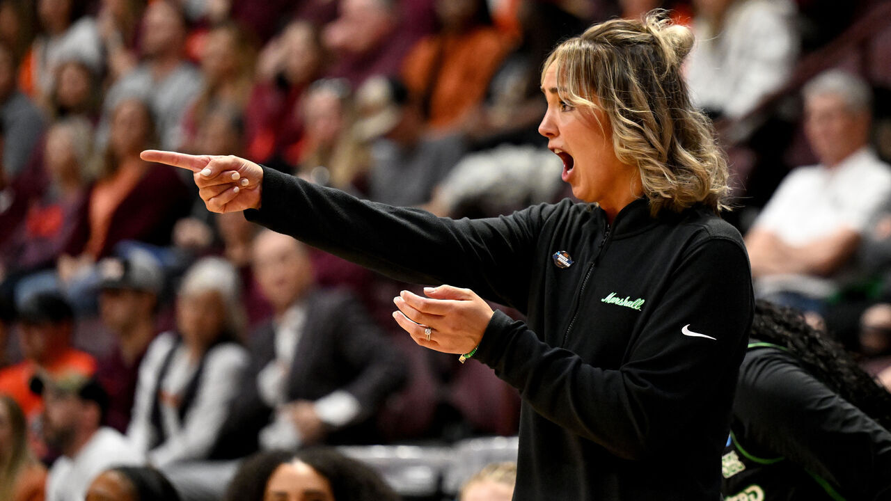 BLACKSBURG, VIRGINIA - MARCH 22: Head coach Kim Caldwell of the Marshall Thundering Herd talks to her players during the first quarter of a game against the Virginia Tech Hokies during the first round of the 2024 NCAA Women's Basketball Tournament held at Cassell Coliseum on March 22, 2024 in Blacksburg, Virginia.
