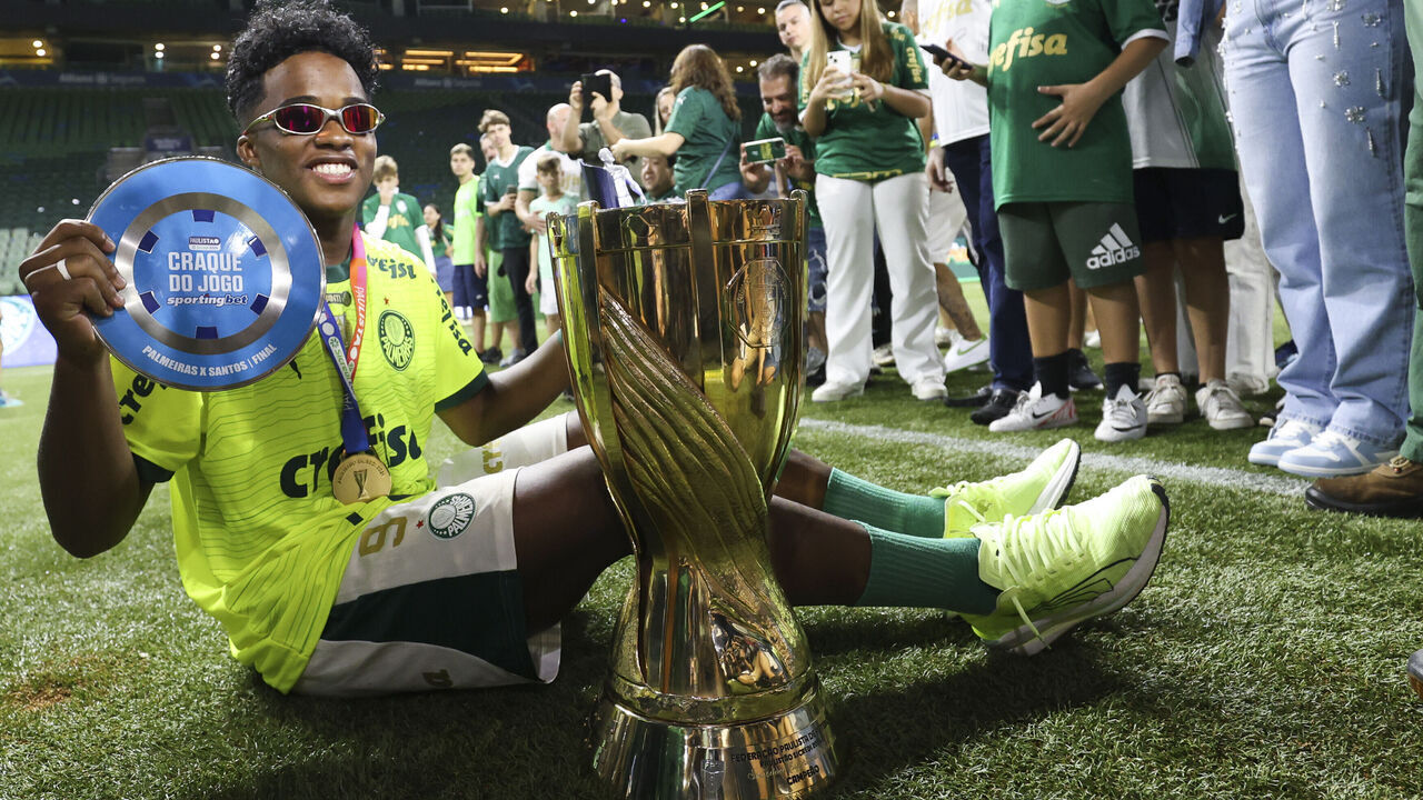 SAO PAULO, BRAZIL - APRIL 07: Endrick of Palmeiras pose for a photo with the trophy after winning the Sao Paulo State Championship second leg final between Palmeiras and Santos at Allianz Parque on April 07, 2024 in Sao Paulo, Brazil.