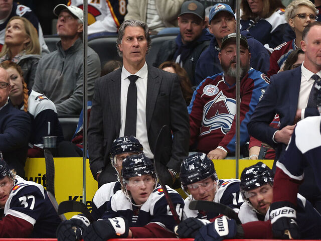 DENVER, COLORADO - APRIL 07: Head coach Jared Bednar of the Colorado Avalanche watches as the team play the Dallas Stars during the first period at Ball Arena on April 07, 2024 in Denver, Colorado.