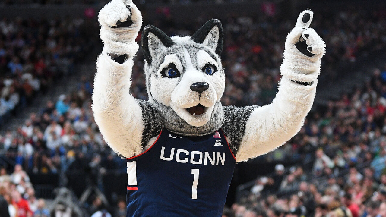 LAS VEGAS, NV - MARCH 25: Jonathan the Husky mascot cheers during the NCAA Division I Men's Championship Elite Eight round basketball game between the Gonzaga Bulldogs and the UConn Huskies on March 25, 2023 at T-Mobile Arena in Las Vegas, NV.