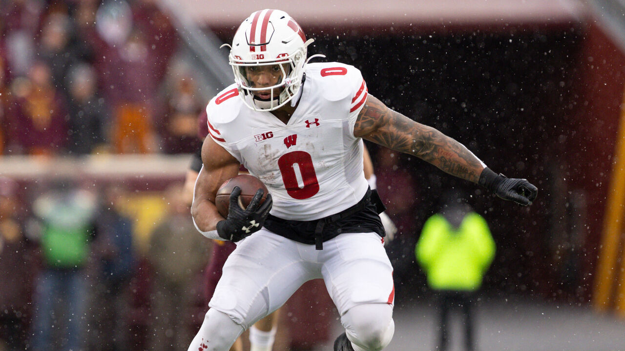 MINNEAPOLIS, MN - NOVEMBER 25: Wisconsin Badgers running back Braelon Allen (0) runs with the ball during the college football game between the Wisconsin Badgers and the Minnesota Golden Gophers on November 25th, 2023, at Huntington Bank Stadium in Minneapolis, MN.