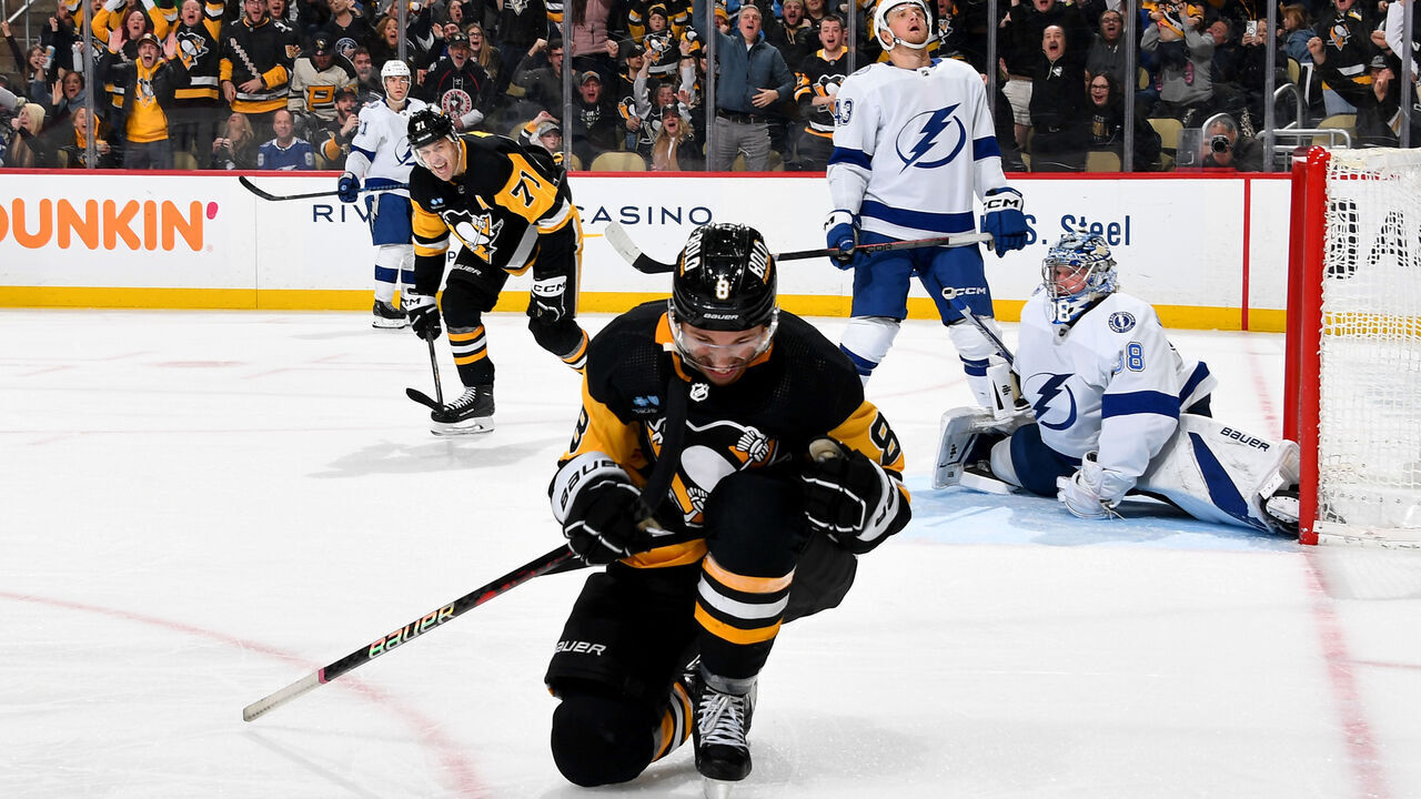 PITTSBURGH, PA - APRIL 06: Michael Bunting #8 of the Pittsburgh Penguins celebrates after after his third period goal against the Tampa Bay Lightning at PPG PAINTS Arena on April 6, 2024 in Pittsburgh, Pennsylvania.