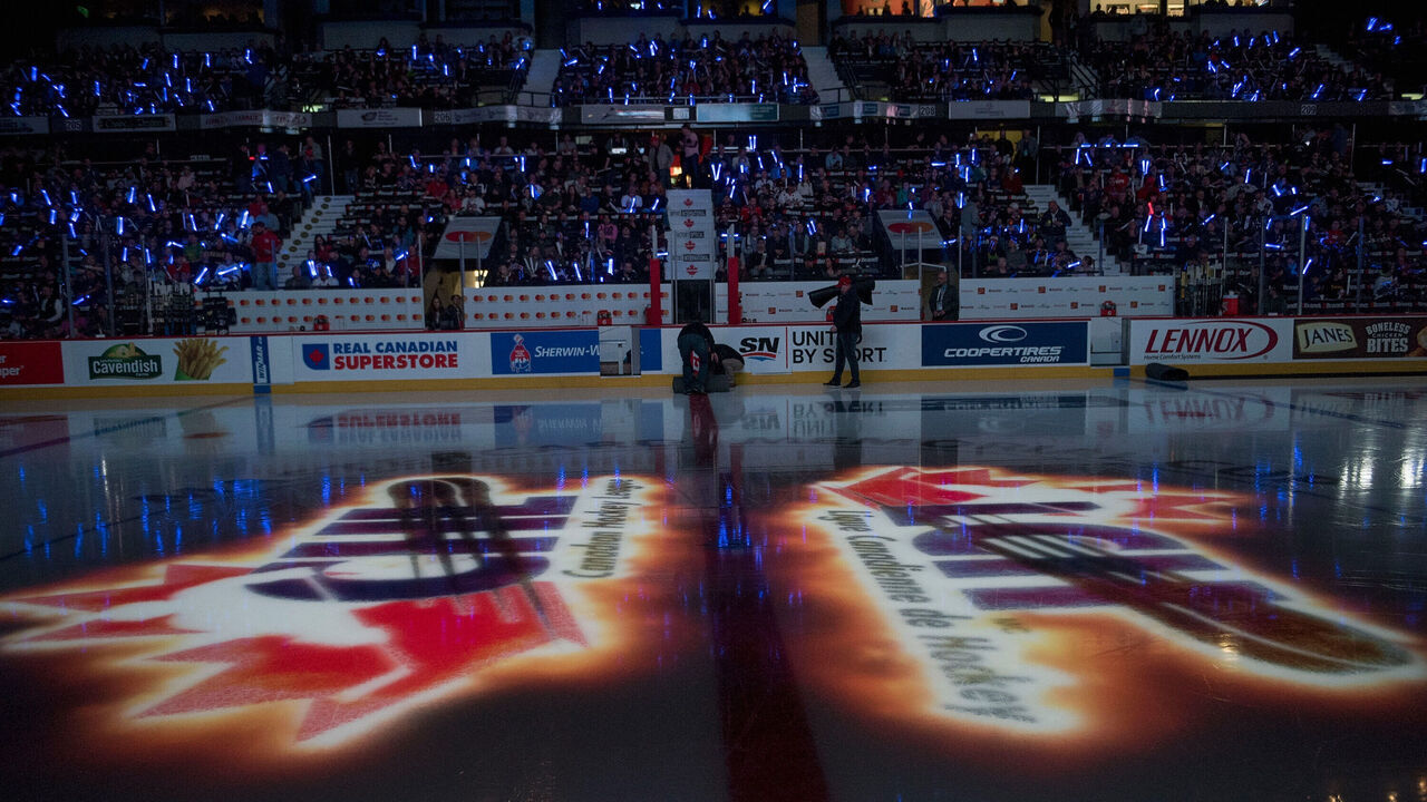 REGINA, SK - MAY 18: The CHL logo is reflected on the ice at the start of game one between the Regina Pats and the Hamilton Bulldogs at Brandt Centre - Evraz Place on May 18, 2018 in Regina, Canada.